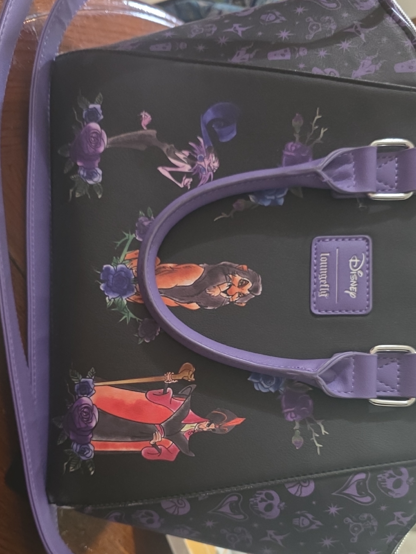 Like New Loungefly Black Satchel With Purple Trim And Disney Villains Print